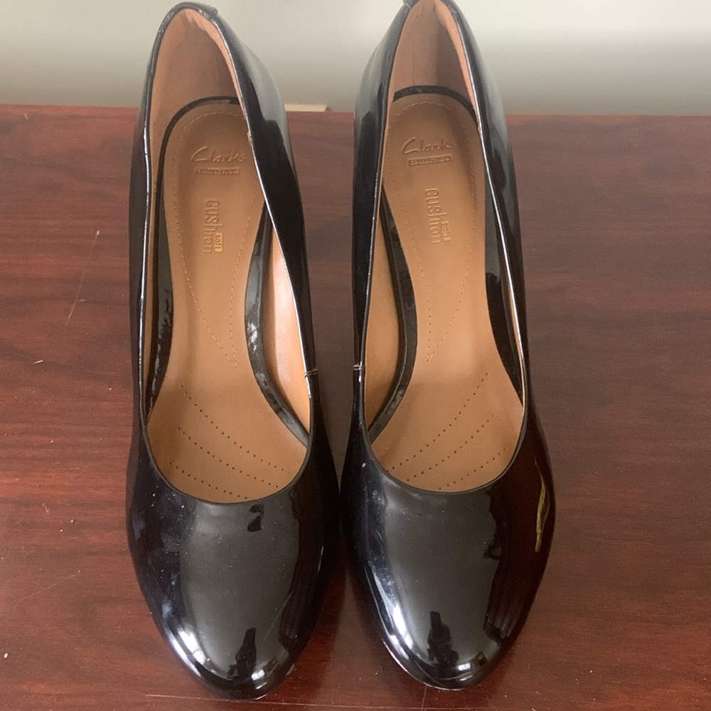 Clark’s black patent leather shoes. Size 10